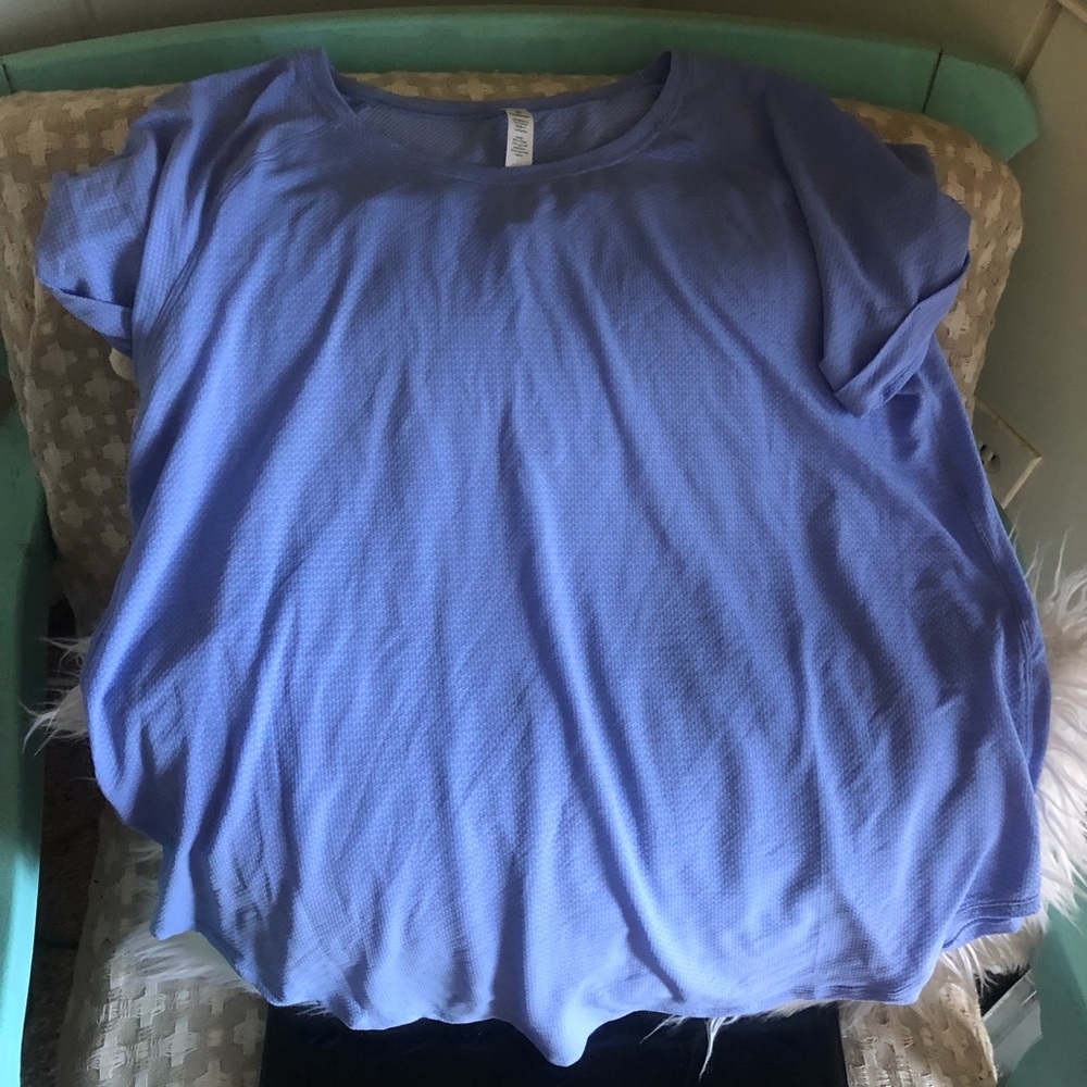 Blue lululemon shirt with open back size 8